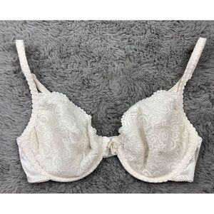 Vintage Victoria’s Secret white lace with embroidered rope base unlined bra